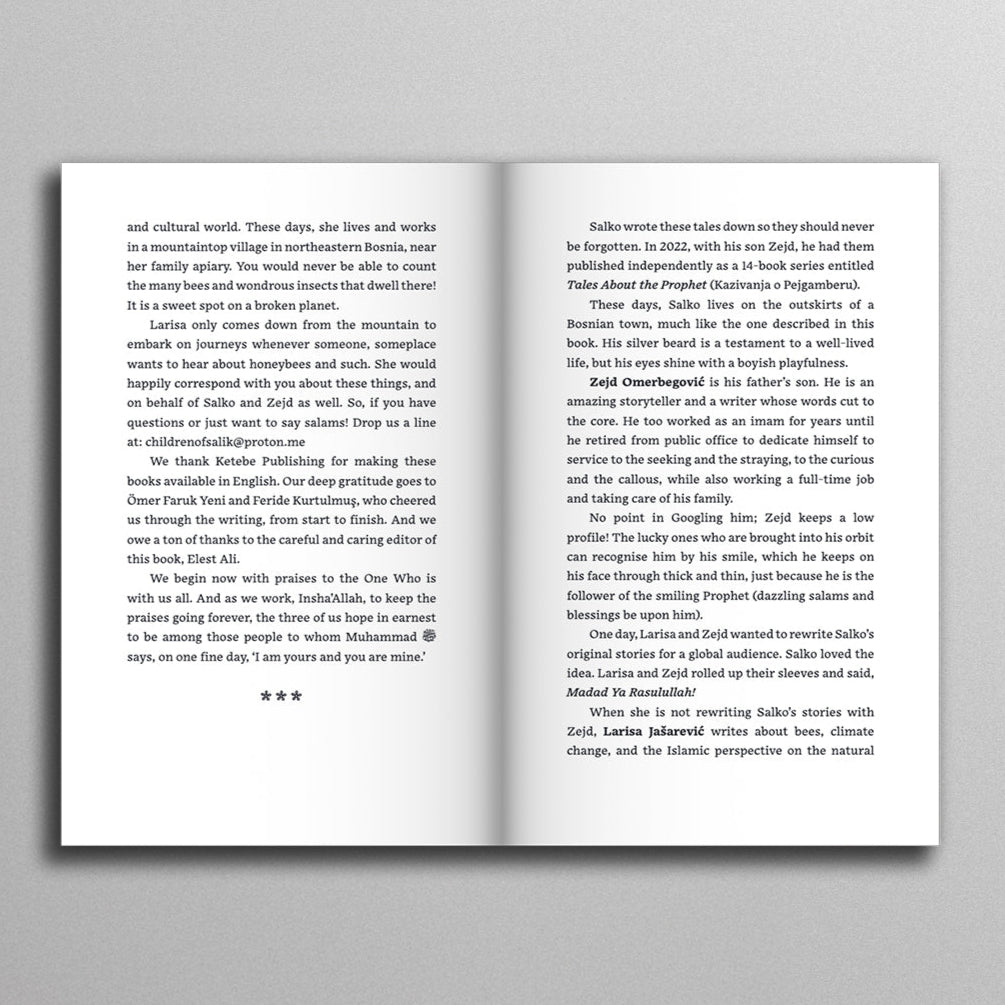 Open book with text on a gray background