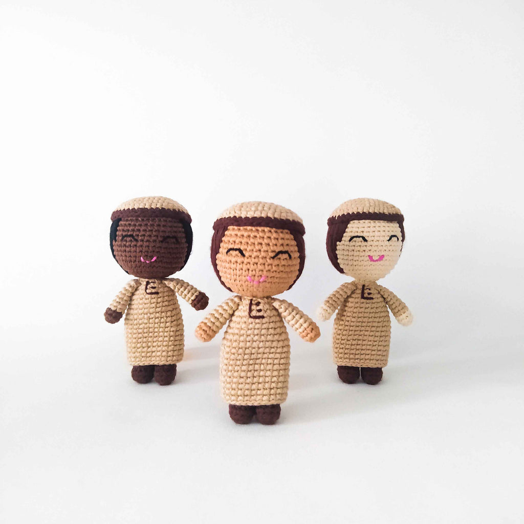 Handmade Muslim Boy Doll with Thobe. These dolls have three different skin tones and are wearing a brown coloured kufi and thobe.